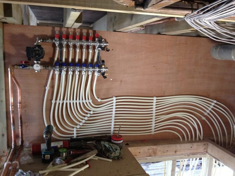 Underfloor heating manifold and pipework installed by VMV Plumbing and Heating