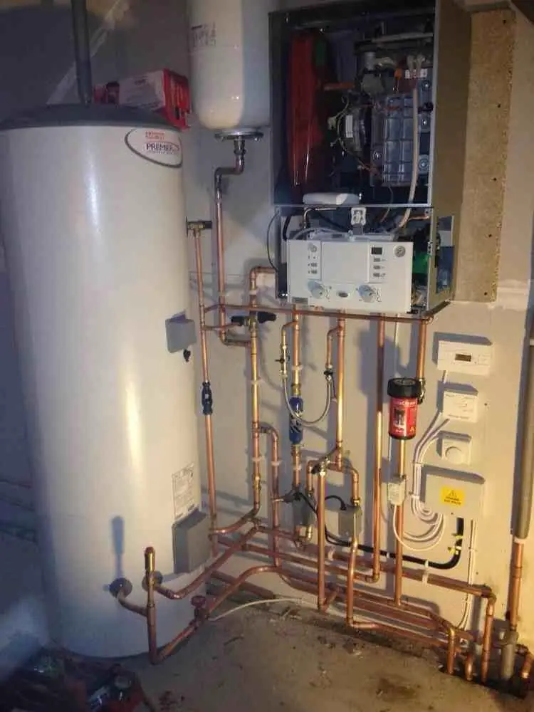 Central heating system with boiler and hot water cylinder installed by VMV Plumbing & Heating in Milton Keynes